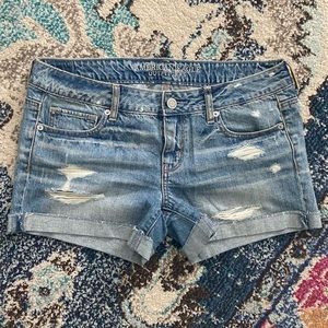 Cuffed distressed shorts